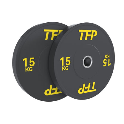 Two black 15 kg olympic bumper plates with yellow TFP branding, shown overlapping on a plain white background.