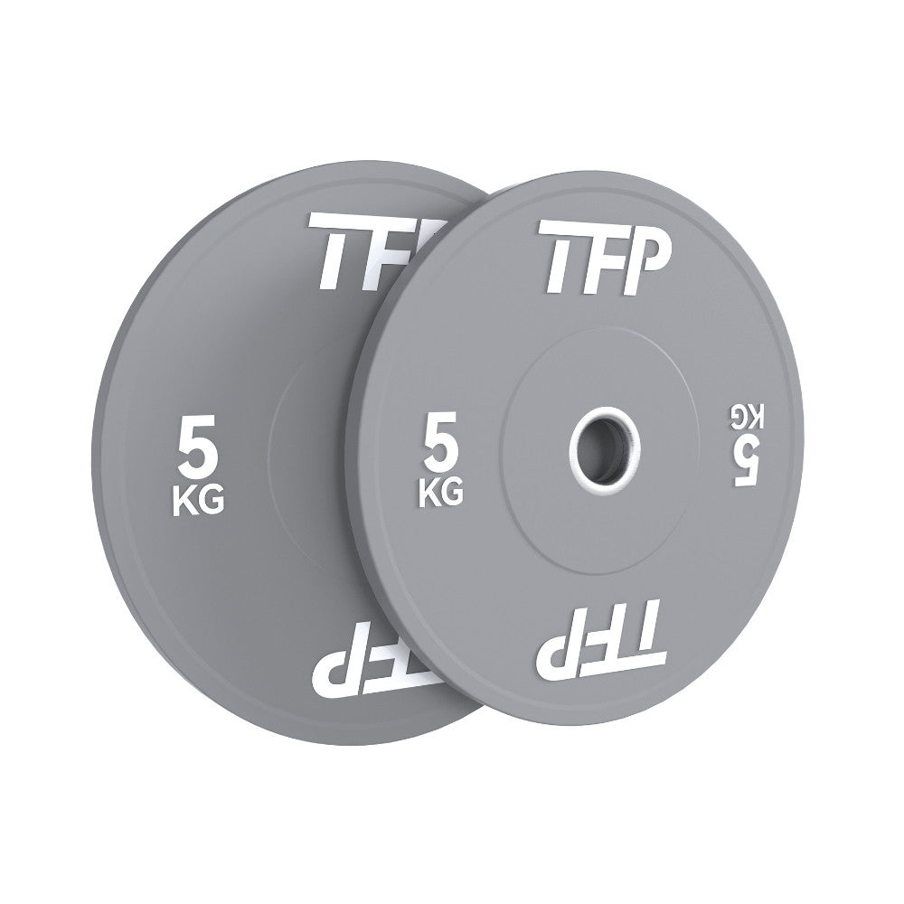 Two grey 5 kg Olympic bumper plates with white TFP branding, shown overlapping on a plain white background.
