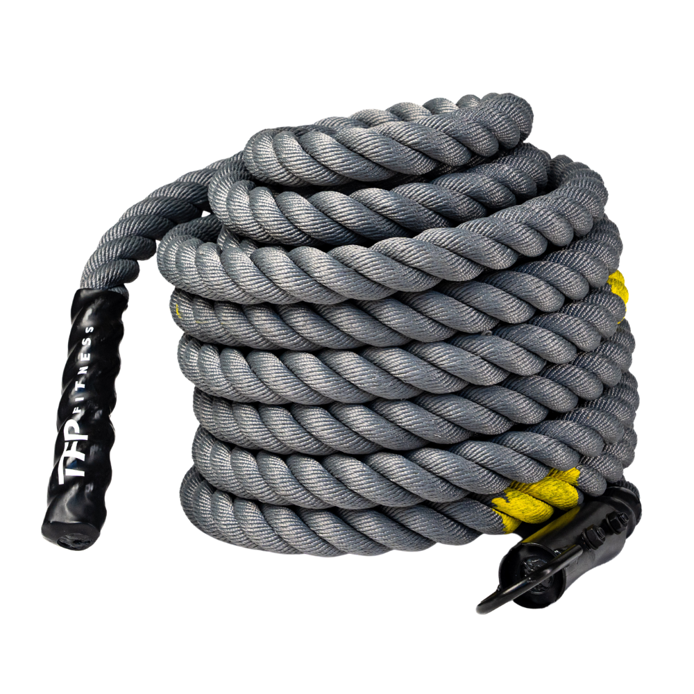 A coiled competition sled rope with black handles and yellow accents, photographed on a clean white background.