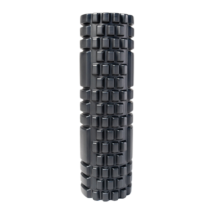 A dark gray textured foam roller with a grid-like pattern of raised rectangular blocks, shown vertically on a plain white background.