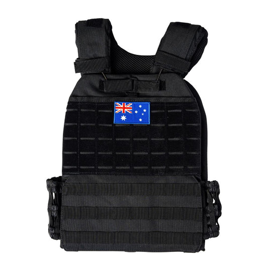 A black tactical vest or plate carrier shown against a plain white background, featuring a small Australian flag patch on the front.
